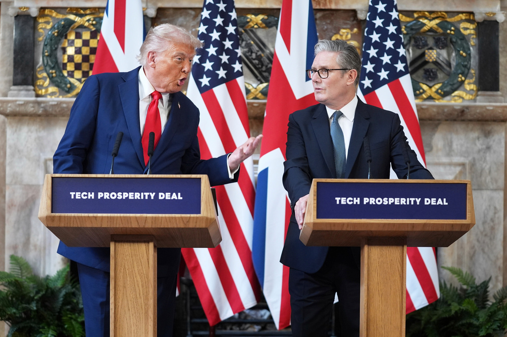 FILE - President Donald Trump gestures next to Britain's Prime Minister Keir Starmer during a joint press conference at Chequers near Aylesbury, England, on Sept. 18, 2025. (AP Photo/Evan Vucci, File)