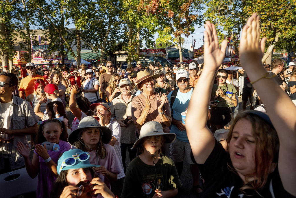 Audience members cheer during the World's Ugliest Dog Contest at the Sonoma County Fair in Santa Rosa, Calif., on Friday, Aug. 8, 2025. (AP Photo/Noah Berger)