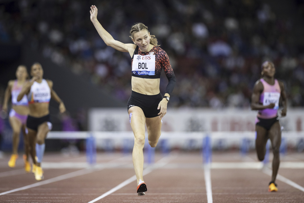 Femke Bol of the Netherlands crosses the finish line winning the women's 400m hurdles competition during the World Athletics Diamond League final 2025 athletics meeting in Zurich, Switzerland, Thursday, Aug. 28, 2025. (Michael Buholzer/Keystone via AP)