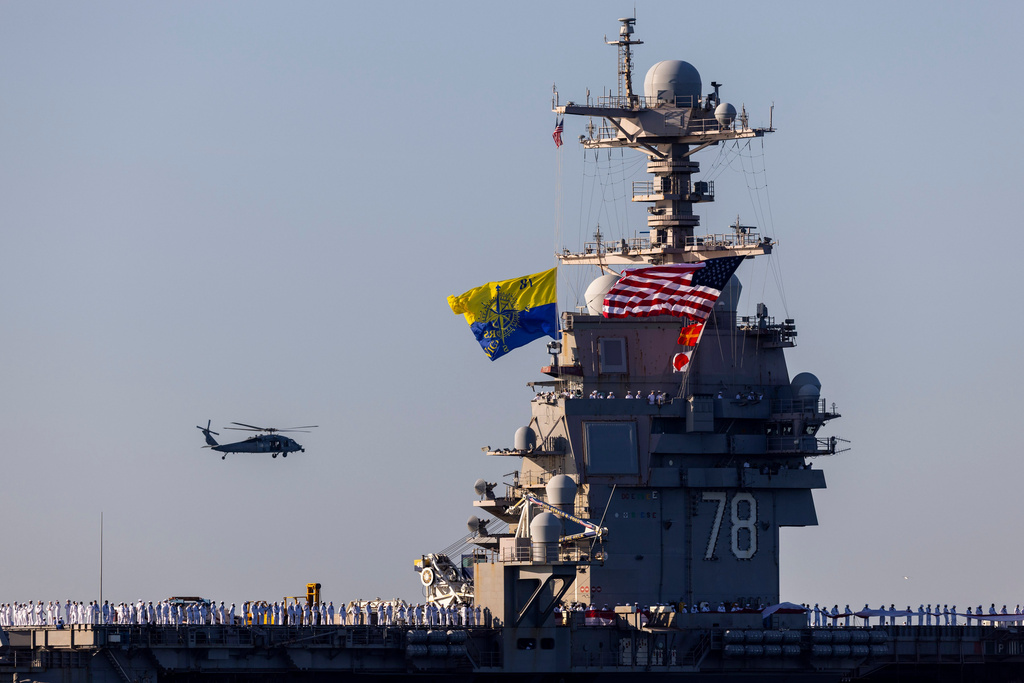 The USS Gerald R. Ford heads toward port at Naval Station Norfolk, as seen from Fort Monroe, Va., on May 16, 2026. (Peter Casey/The Virginian-Pilot via AP)