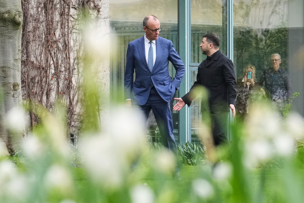 German chancellor Friedrich Merz welcomes Ukraine's President Volodymyr Zelenskyy for German-Ukrainian government consultations in Berlin Germany, Tuesday, April 14, 2026. (AP Photo/Markus Schreiber)