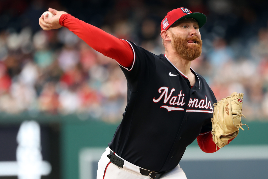 Washington Nationals pitcher Zack Littell throws during the third inning of a baseball game against the Arizona Diamondbacks, Friday, July 24, 2026, in Washington. (AP Photo/Daniel Kucin Jr.)