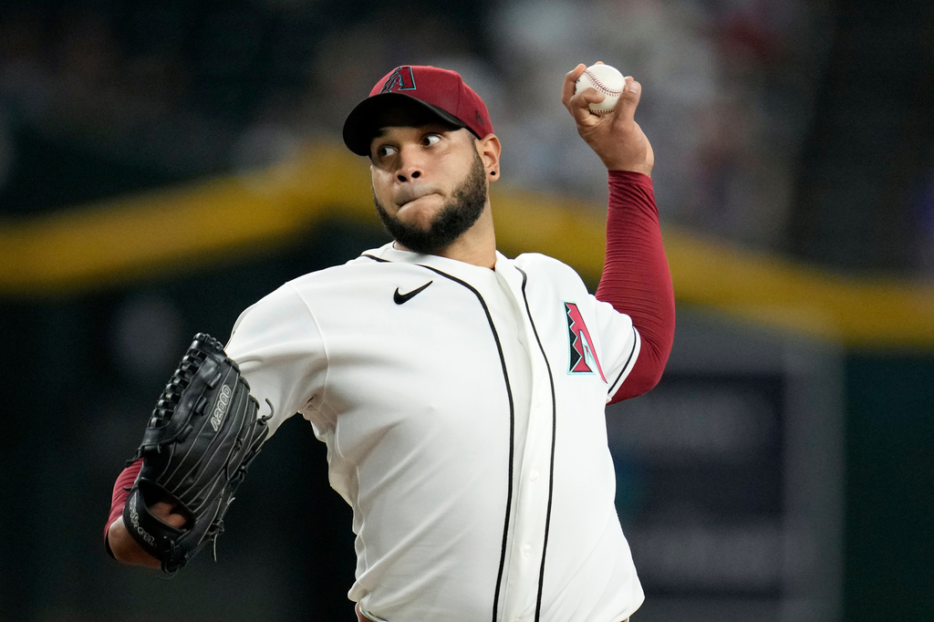 Arizona Diamondbacks starting pitcher Eduardo Rodriguez throws against the Chicago Cubs during the first inning of a baseball game, Wednesday, Aug. 26, 2026, in Phoenix. (AP Photo/Ross D. Franklin)