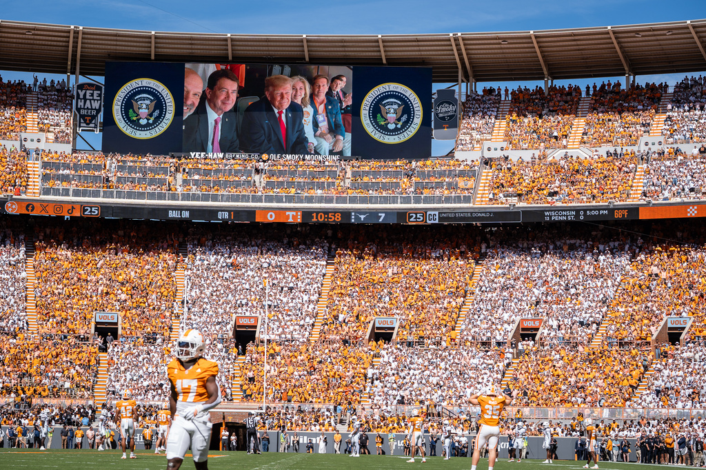 President Donald Trump is displayed on the scoreboard as he attends the Tennessee-Texas NCAA college football game in Knoxville, Tenn., Saturday, Sept. 26, 2026. (Sara Diggins/The San Antonio Express-News via AP)