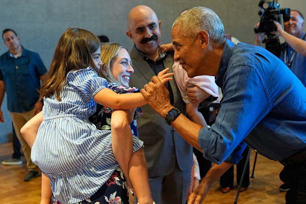 Former President Barack Obama greets the first group of visitors at the official opening of the Obama Presidential Center in Chicago, Friday, June 19, 2026. (AP Photo/Pablo Martinez Monsivais, Pool)