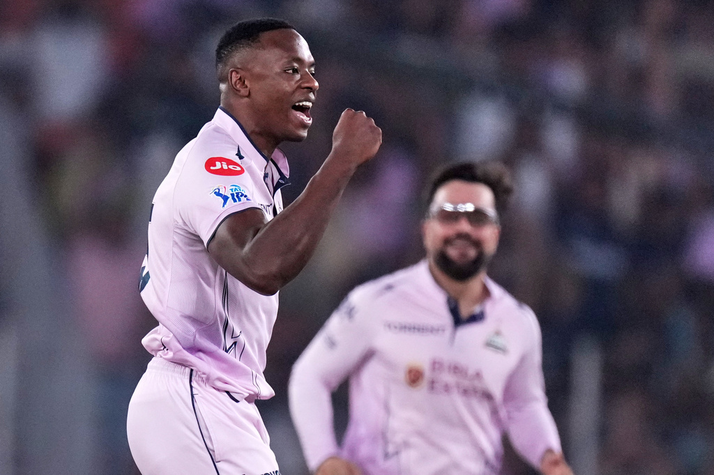 Gujarat Titans' Kagiso Rabada celebrates the wicket of Sunrisers Hyderabad's Abhishek Sharma during the Indian Premier League cricket match between Gujarat Titans and Sunrisers Hyderabad, in Ahmedabad, India, Tuesday, May 12, 2026. (AP Photo/Ajit Solanki)