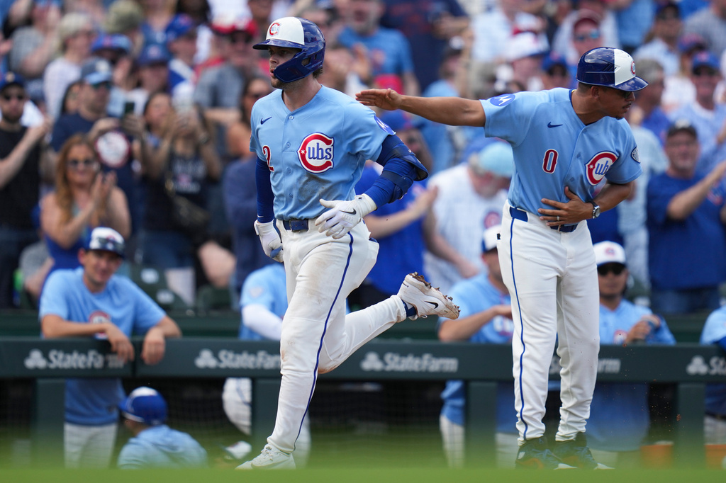 Chicago Cubs' Nico Hoerner (2) runs the bases after hitting a two-run home run during the second inning of a baseball game against the New York Mets, Friday, April 17, 2026, in Chicago. (AP Photo/Erin Hooley)