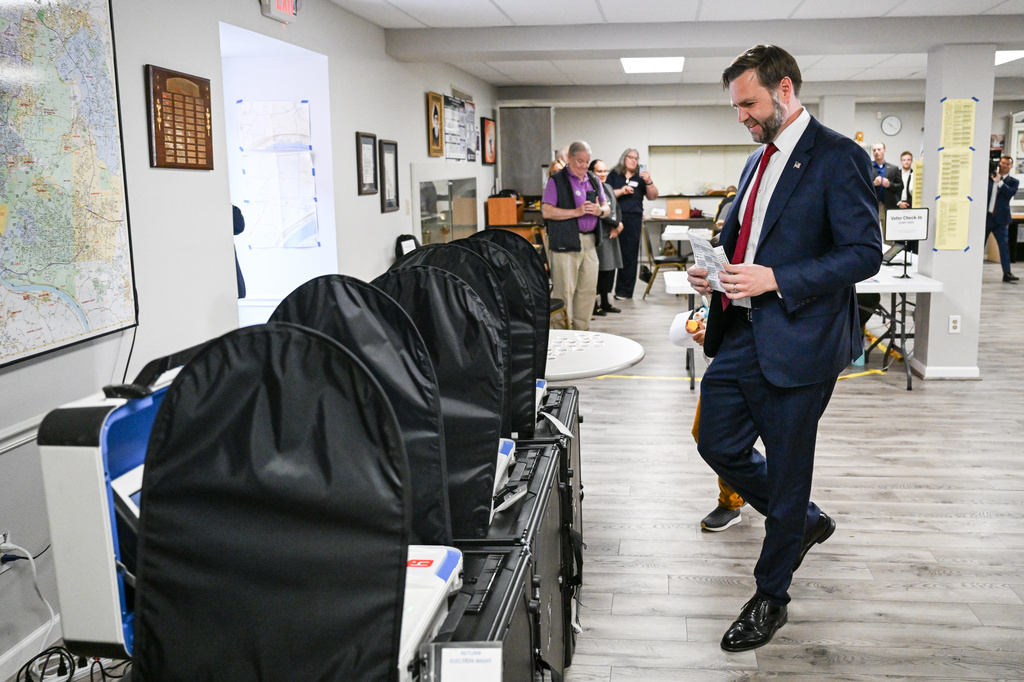 Vice President JD Vance casts his ballot to vote at a polling location at St. Anthony of Padua Maronite Catholic Church in the state's primary election, Tuesday, May 5, 2026, in Cincinnati, Ohio. Vance is stopping in Ohio to vote in the state's primary election before continuing on to Oklahoma and Iowa. (Roberto Schmidt /Pool Photo via AP)