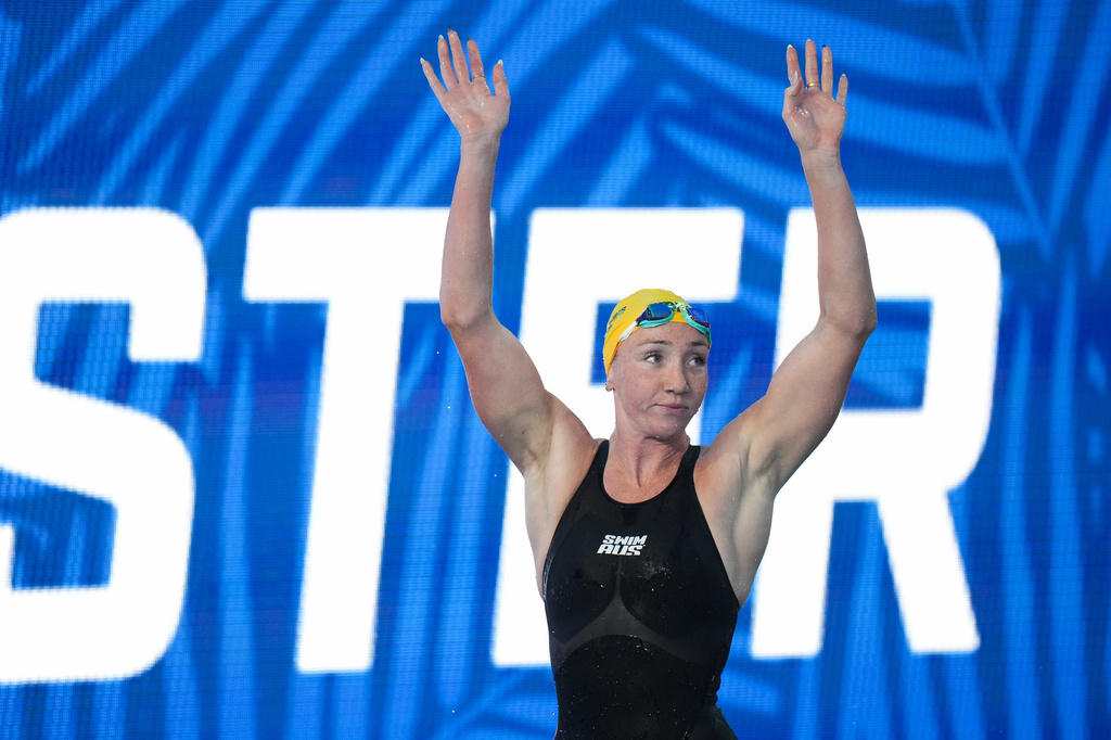 Lani Pallister, of Australia, celebrates after winning the the women's 200-meter freestyle final at the Pan Pacific Swimming Championships in Irvine, Calif., Wednesday, Aug. 12, 2026. (AP Photo/Jae C. Hong)