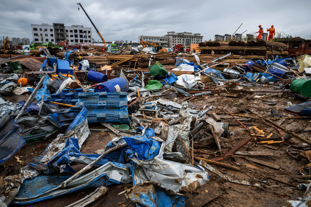 In this photo released by Xinhua News Agency, rescuers conduct work at a tornado-hit logistics park in Huangzhou District of Huanggang City in central China's Hubei Province on Tuesday, July 7, 2026. (Wu Zhizun/Xinhua via AP)