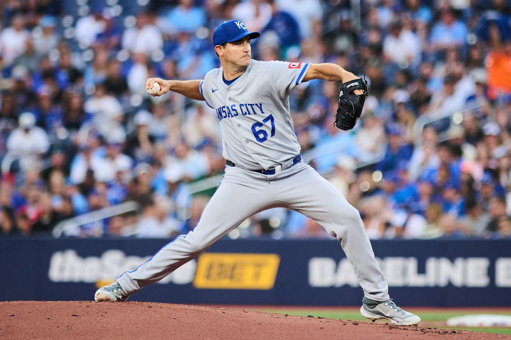 Kansas City Royals pitcher Seth Lugo (67) works against the Toronto Blue Jays during the second inning of a baseball game in Toronto, Tuesday, Aug. 25, 2026. (Sammy Kogan/The Canadian Press via AP)