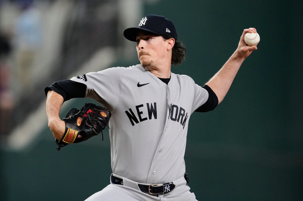 New York Yankees pitcher Max Fried throws to the Texas Rangers in the first inning of a baseball game Monday, April 27, 2026, in Arlington, Texas. (AP Photo/Tony Gutierrez)
