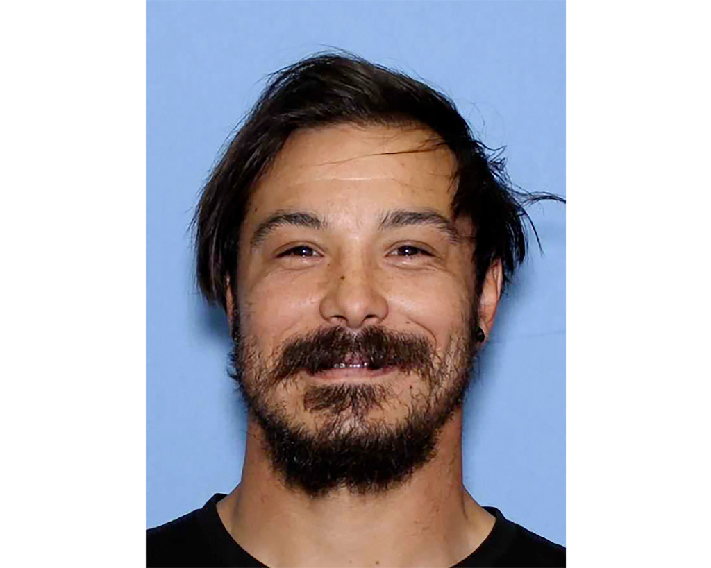 FILE - This undated photo provided by the Wenatchee Police Department shows Travis Caleb Decker, who is wanted in connection with the deaths of his three daughters. (Wenatchee Police Department via AP, File)