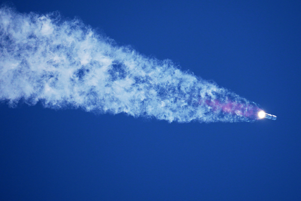 SpaceX's mega rocket Starship makes a test flight from Starbase, Texas, Friday, July 24, 2026. (AP Photo/Eric Gay)