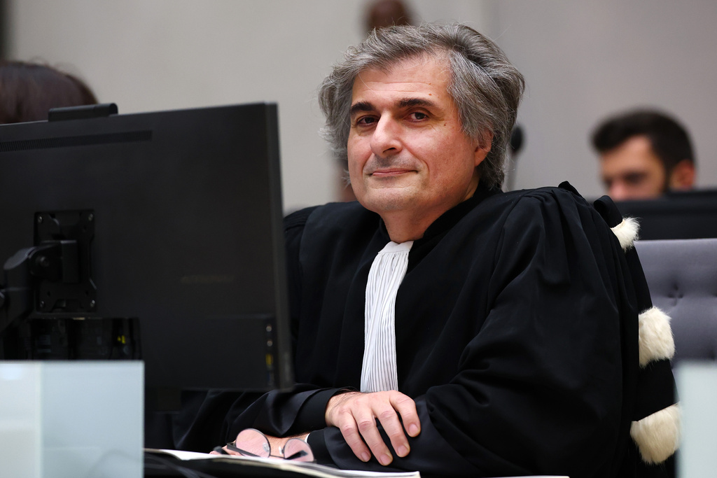 Lead Counsel for the Defence, Cyril Laucci, attends a hearing at the International Criminal Court (ICC) in The Hague, Netherlands, Monday, Oct. 6, 2025. (Piroschka van de Wouw/Pool Photo via AP)