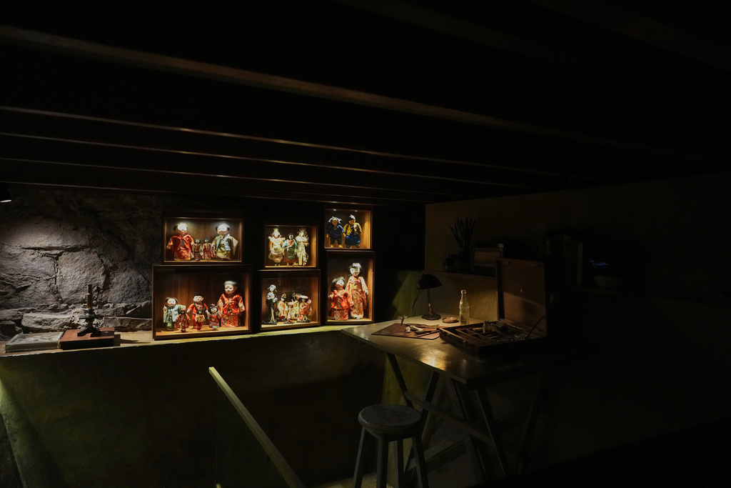 Asian dolls Frida Kahlo purchased during a trip to San Francisco are displayed in the basement inside the new museum Casa Kahlo in Mexico City, Wednesday, Sept. 10, 2025. (AP Photo/Eduardo Verdugo)