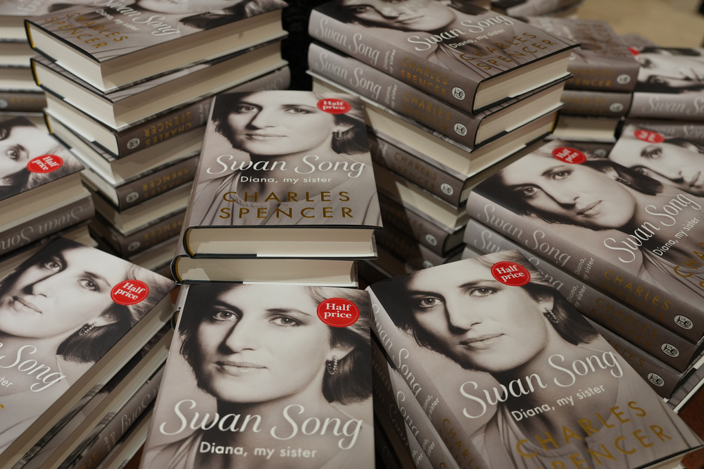 Copies of a new book by Earl Spencer, brother of the late Princess Diana, entitled "Swan Song: Diana, My Sister," on display in a bookshop in central London, Tuesday, Sept. 22, 2026. (AP Photo/Kin Cheung)