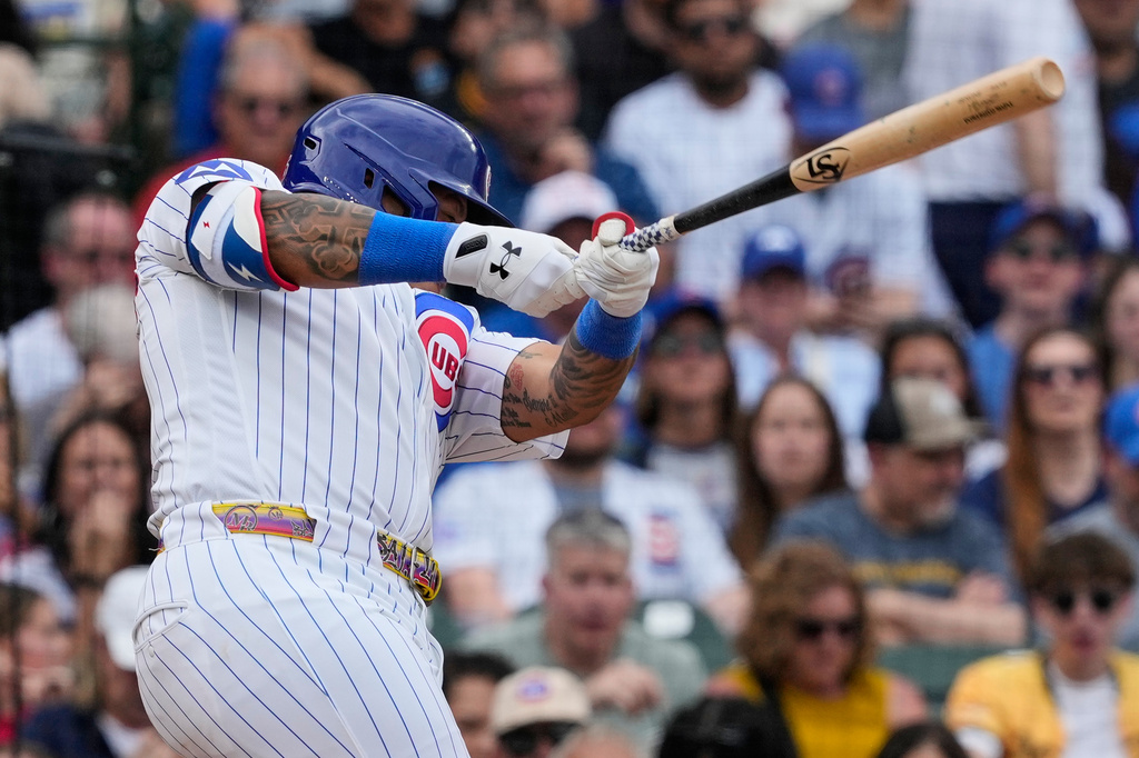 Chicago Cubs' Moisés Ballesteros hits a single during the fifth inning of a baseball game against the Pittsburgh Pirates in Chicago, Sunday, April 12, 2026. (AP Photo/Nam Y. Huh)