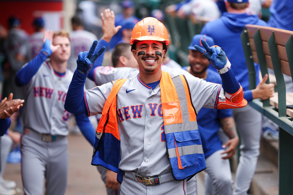 New York Mets' Mark Vientos gestures in the dugout after hitting a home run during the fourth inning of a baseball game against the Los Angeles Angels, Sunday, May 3, 2026, in Anaheim, Calif. (AP Photo/Jessie Alcheh)