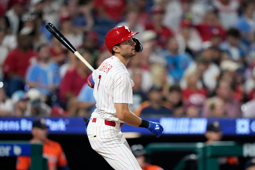 Philadelphia Phillies' Trea Turner watches after hitting a home run against Houston Astros pitcher Hunter Brown during the fifth inning of a baseball game Wednesday, Sept. 9, 2026, in Philadelphia. (AP Photo/Matt Slocum)