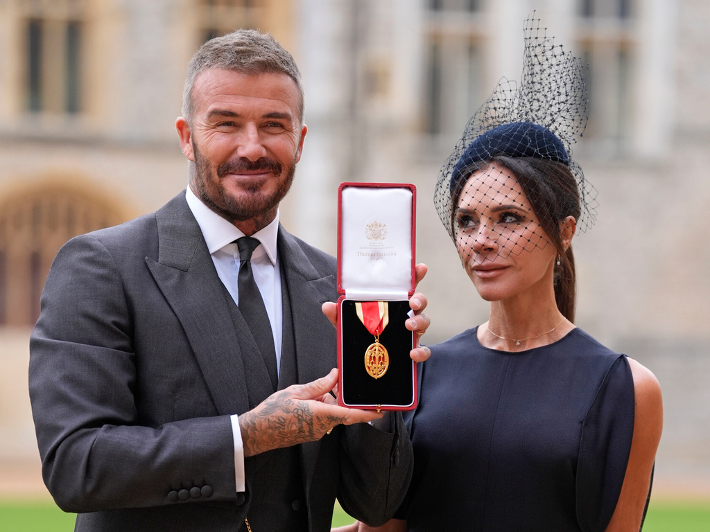 Sir David Beckham, with his wife Lady Victoria, after he was made a Knight Bachelor at an investiture ceremony at Windsor Castle, Berkshire, England, Tuesday, Nov. 4, 2025. (Andrew Matthews/Pool Photo via AP)