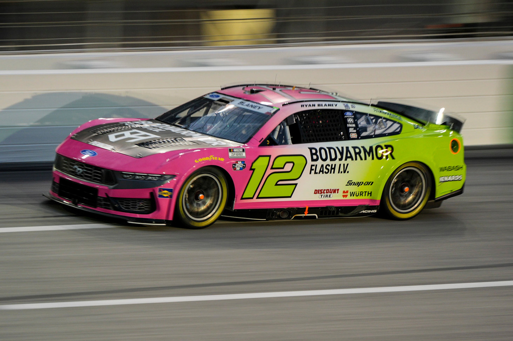 Ryan Blaney (12) moves during a NASCAR Cup Series auto race, Sunday, July 12, 2026, in Hampton, Ga. (AP Photo/Mike Stewart)