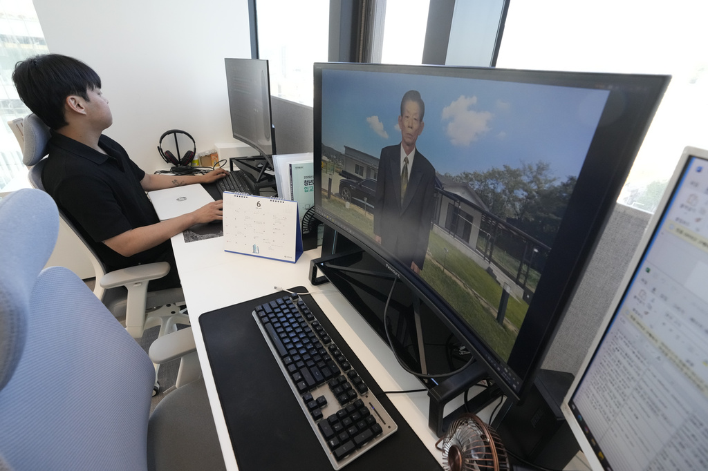 A computer screen as a video clip shows a digital likeness of Lee Geon Hui's late grandfather speaking at Seoul-based tech firm Vaice, South Korea, Friday, June 12, 2026. (AP Photo/Ahn Young-joon)