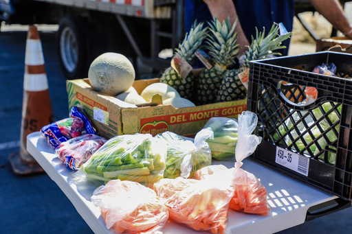 FILE - Fresh produce is available for bagged meals in Edwards, Colo., March 16, 2020. (Chris Dillmann/Vail Daily via AP, File) FILE - Fresh produce is available for bagged meals in Edwards, Colo., March 16, 2020. (Chris Dillmann/Vail Daily via AP, File)