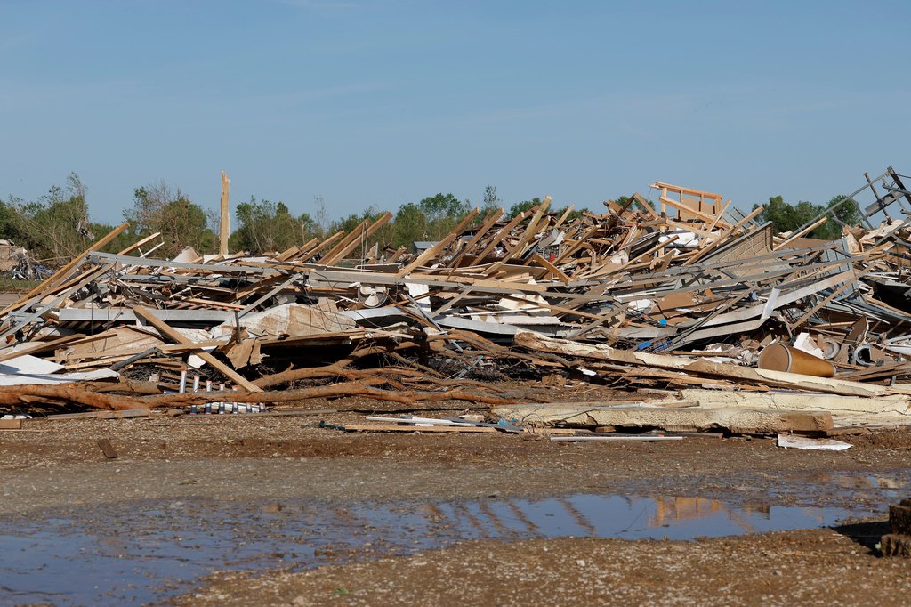 Buildings lie in shreds in Enid, Okla., Friday, April 24, 2026, in the aftermath of a tornado that barreled through Oklahoma Thursday. (AP Photo/Alonzo Adams)