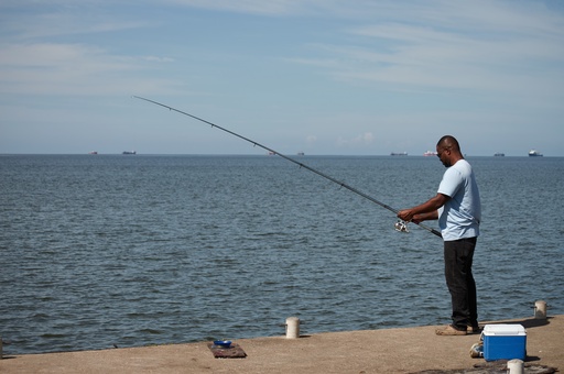 A man fishes in Cocorite, Trinidad and Tobago, Friday, Oct. 3, 2025. (AP Photo/Anselm Gibbs) A man fishes in Cocorite, Trinidad and Tobago, Friday, Oct. 3, 2025. (AP Photo/Anselm Gibbs)