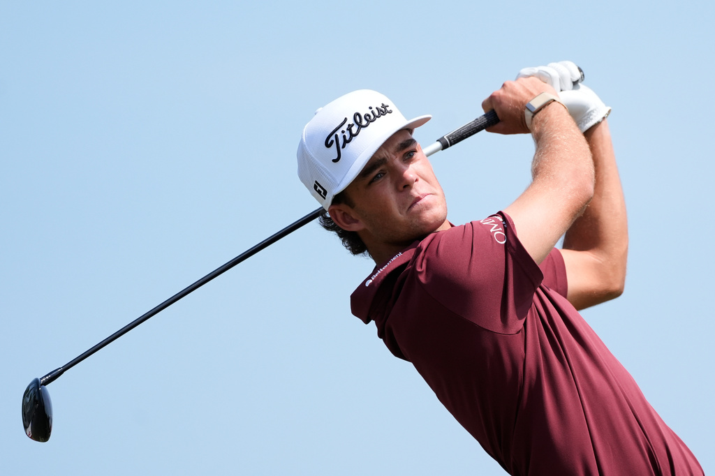 Jackson Koivun hits from the sixth tee during the first round of the 3M Open golf tournament at the Tournament Players Club Thursday, July 23, 2026, in Blaine, Minn. (AP Photo/Bruce Kluckhohn)