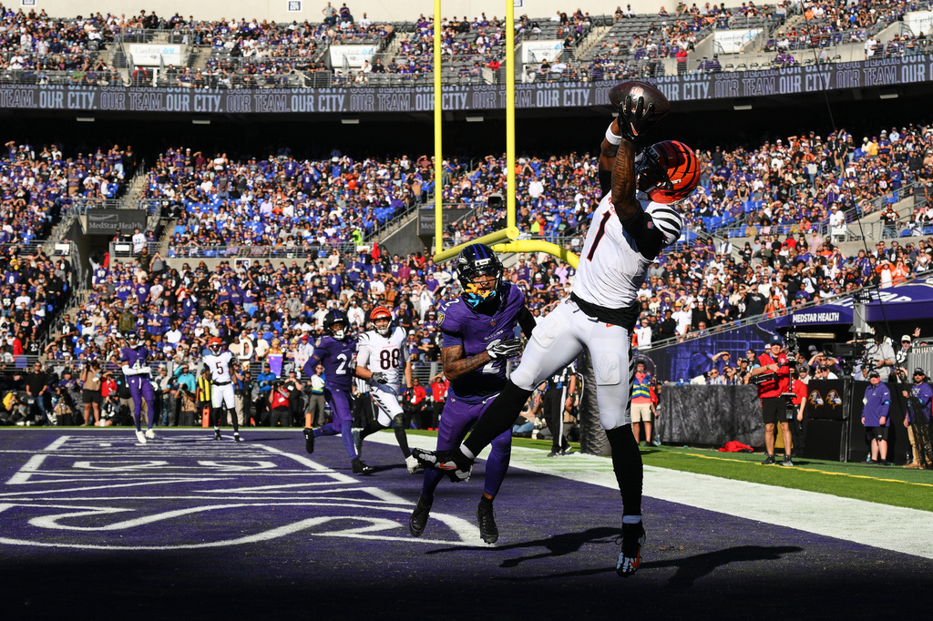 Cincinnati Bengals wide receiver Ja'marr Chase (1) scores a touchdown during the second half of an NFL football game against the Baltimore Ravens in Baltimore, Sunday, Oct. 25, 2026. (AP Photo/Nick Wass)