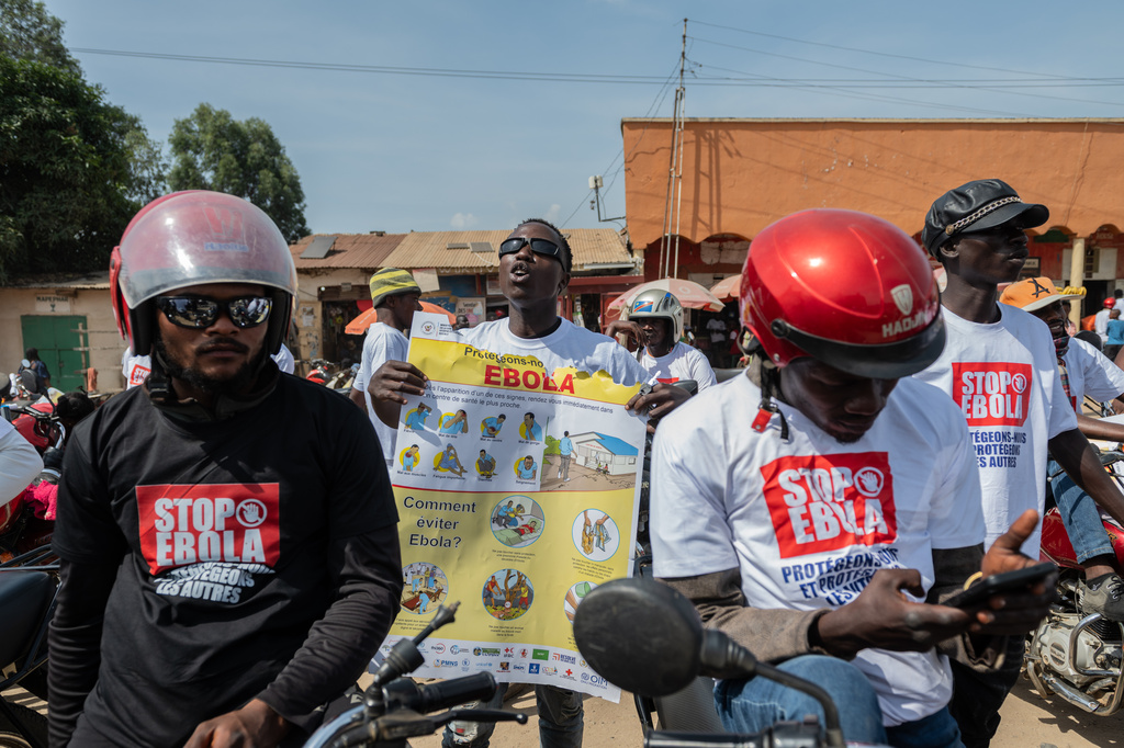 Motorcyclists join an awareness campaign organized by the World Health Organization (WHO) to combat Ebola in Bunia, Congo, Wednesday, June 10, 2026. (AP Photo/Moses Sawasawa)