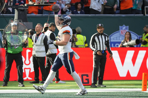 Denver Broncos tight end Nate Adkins (45) celebrates after scoring a touchdown in the first half of an NFL football game between the Denver Broncos and the New York Jets, Sunday, Oct. 12, 2025, in London. (AP Photo/Kin Cheung) Denver Broncos tight end Nate Adkins (45) celebrates after scoring a touchdown in the first half of an NFL football game between the Denver Broncos and the New York Jets, Sunday, Oct. 12, 2025, in London. (AP Photo/Kin Cheung)
