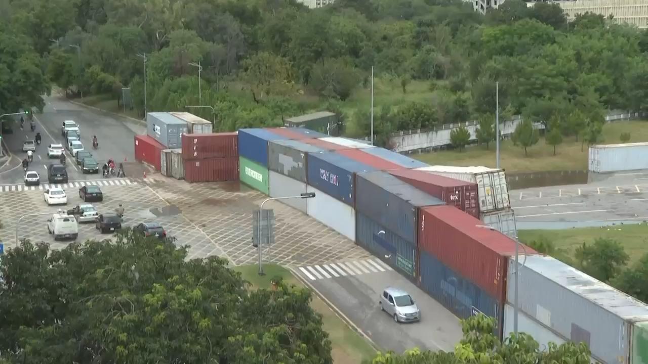 Shipping containers were used to block streets across Islamabad as authorities sought to prevent a planned protest march by supporters of imprisoned former Prime Minister Imran Khan's Pakistan Tehreek-e-Insaf party (PTI). (AP video: Muhammad Yousaf).