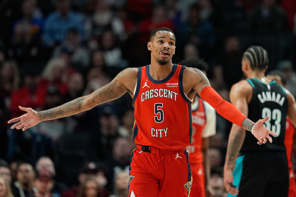 New Orleans Pelicans forward Dejounte Murray (5) reacts during the first half of an NBA basketball game against the Portland Trail Blazers, Thursday, April 2, 2026, in Portland, Ore. (AP Photo/Jenny Kane)