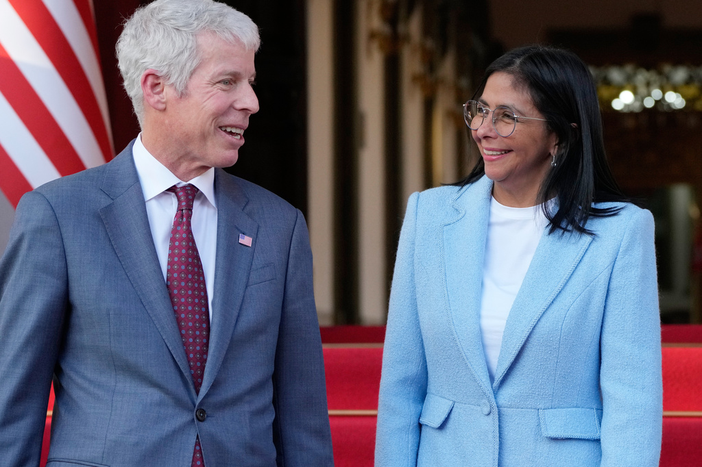 FILE - Venezuela's acting President Delcy Rodriguez bids farewell to U.S. Energy Secretary Chris Wright after their meeting at Miraflores Palace in Caracas, Venezuela, Wednesday, Feb. 11, 2026. (AP Photo/Ariana Cubillos, File)