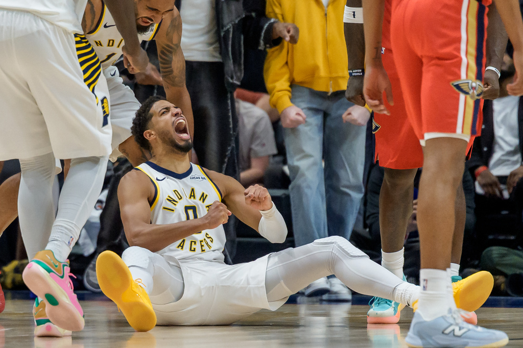 Indiana Pacers guard Tyrese Haliburton (0) reacts to a basket and foul call during the fourth quarter against the New Orleans Pelicans in New Orleans, Wednesday, Oct. 21, 2026. (AP Photo/Matthew Hinton)