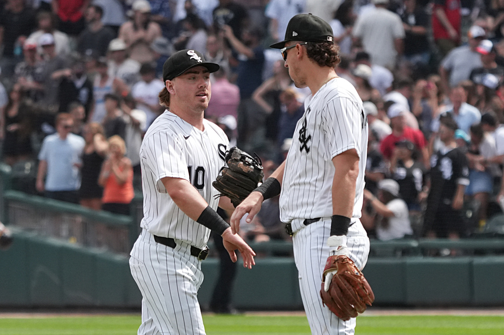 Chicago White Sox shortstop Colson Montgomery, right, and second baseman Chase Meidroth, left, celebrate after a baseball game against the Athletics, Saturday, July 11, 2026, in Chicago. (AP Photo/David Banks)