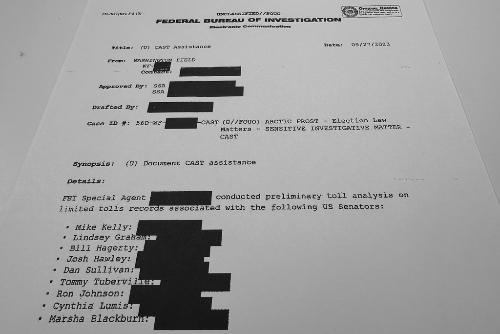 A FBI memo dated Sept. 27, 2023, is photographed Monday, Oct. 6, 2025, after being released by several Republican senators, including Sen. Chuck Grassley, R-Iowa, who chairs the Judiciary Committee that oversees the FBI. (AP Photo/Jon Elswick)