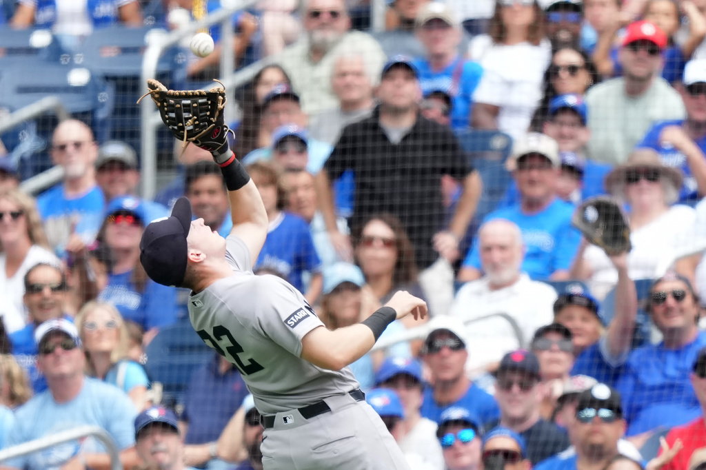 New York Yankees first baseman Ben Rice catches a pop flyout during the first inning of a baseball game against the Toronto Blue Jays in Toronto, Sunday, Aug. 16, 2026. (Nathan Denette/The Canadian Press via AP)