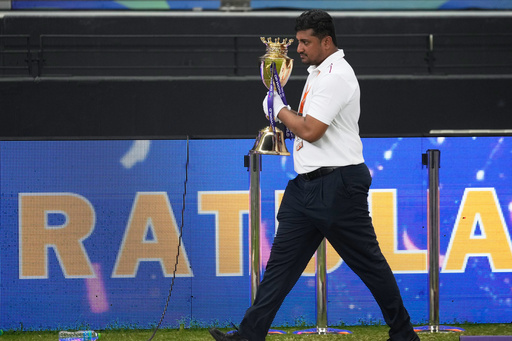 An official removes the winners' trophy from the presentation area after India won the Asia Cup cricket final against Pakistan at Dubai International Cricket Stadium, United Arab Emirates, Sunday, Sept. 28, 2025. (AP Photo/Altaf Qadri) An official removes the winners' trophy from the presentation area after India won the Asia Cup cricket final against Pakistan at Dubai International Cricket Stadium, United Arab Emirates, Sunday, Sept. 28, 2025. (AP Photo/Altaf Qadri)