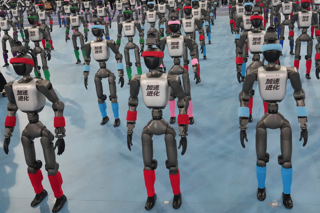 Robots are prepared ahead the opening ceremony of the World Humanoid Robot Games in Beijing, Saturday, Aug. 22, 2026. (AP Photo/Achmad Ibrahim)