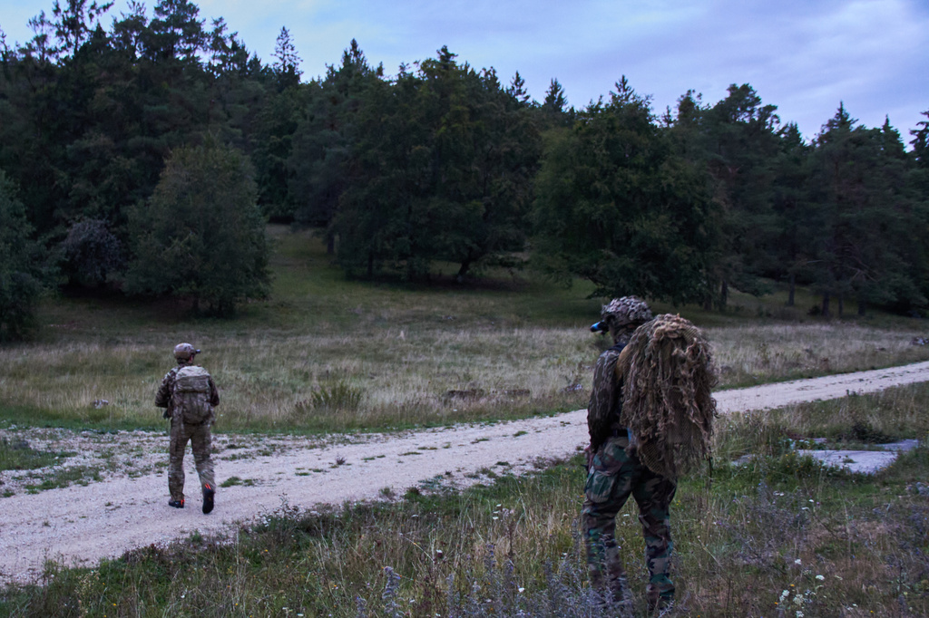 US special forces patrol during a joint military exercise with forces from Poland at the Joint Multinational Readiness Center in Hohenfels near Nuernberg, Germany, Friday, Aug. 28, 2026. (AP Photo/Konstantin Toropin)