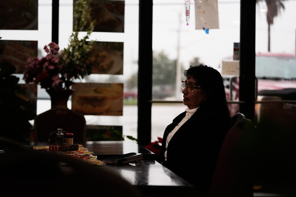 Carmela Diaz speaks inside her closed restaurant in the midst of a Customs and Border Protection immigration crackdown in Kenner, La., Thursday, Dec. 4, 2025. (AP Photo/Gerald Herbert)