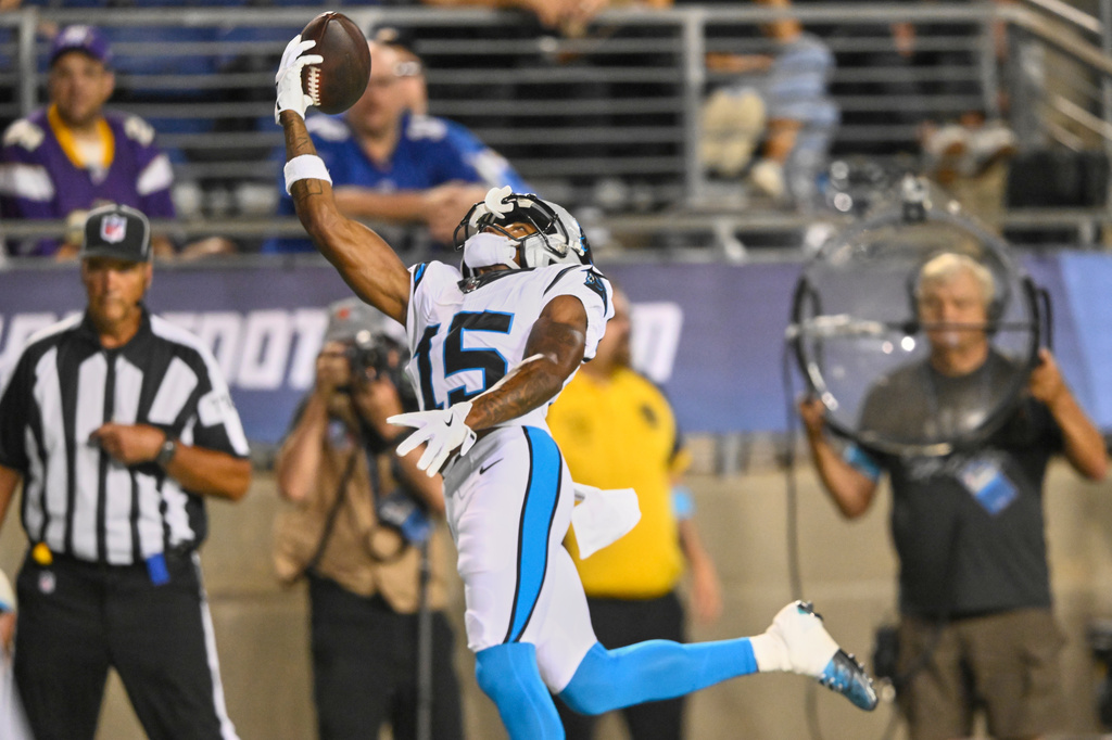 Carolina Panthers wide receiver Jimmy Horn Jr. (15) reaches for but can't hold onto a pass in the first half of the Pro Football Hall of Fame NFL preseason game against the Arizona Cardinals in Canton, Ohio, Thursday, Aug. 6, 2026. (AP Photo/David Richard)