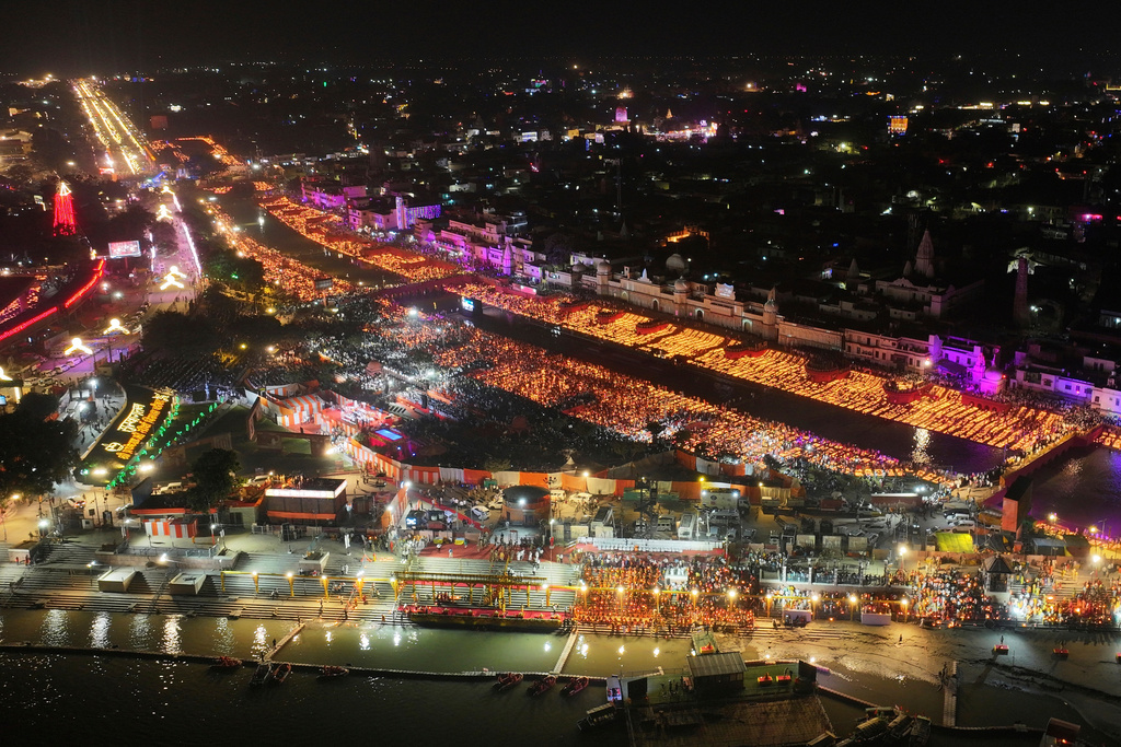 FILE - A record 2.51 million earthen oil lamps are lit along the Saryu river during Deepotsav celebrations on the eve of Diwali, creating a new Guinness World Record, in Ayodhya, India, Wednesday, Oct. 30, 2024. (AP Photo/Rajesh Kumar Singh,File)