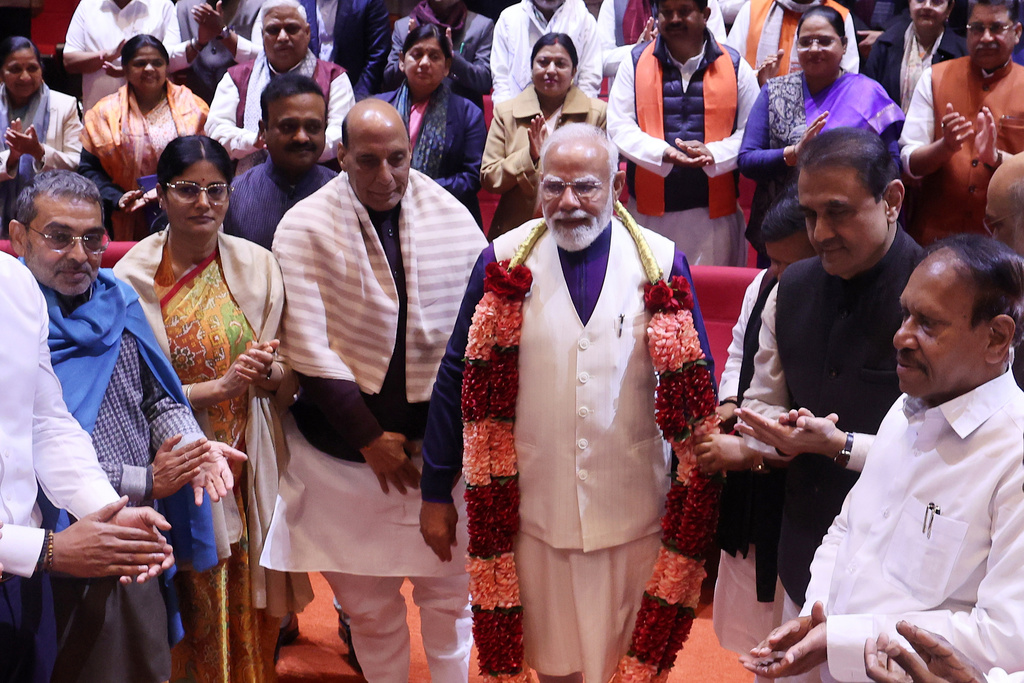 National Democratic Alliance (NDA) and India's ruling Bharatiya Janata Party (BJP) leaders felicitate Indian Prime Minister Narendra Modi, center, on successful completion of India-US trade deal, during a meeting in New Delhi, India, Tuesday, Feb. 3, 2026. (AP Photo)