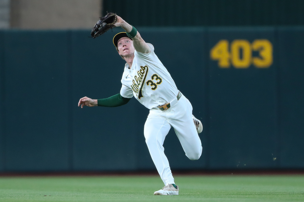 Athletics center fielder Henry Bolte catches a fly ball for the out during the fifth inning of a baseball game against the Miami Marlins Friday, July 3, 2026, in West Sacramento, Calif. (AP Photo/Scott Marshall)