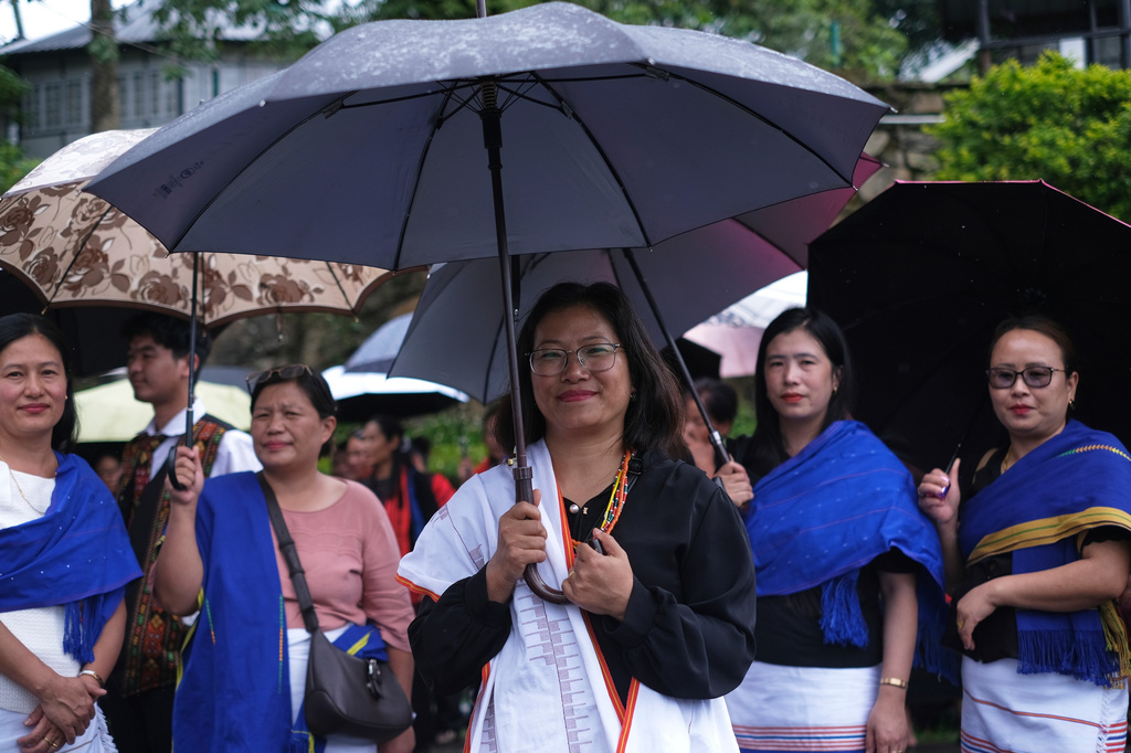Vizhula nyusou, 47, participates in a protest against rising cases of sexual violence against women and demanding justice for victims, in Kohima, capital of the northeastern Indian state of Nagaland, Friday, June 19, 2026. (AP Photo/Yirmiyan Arthur)